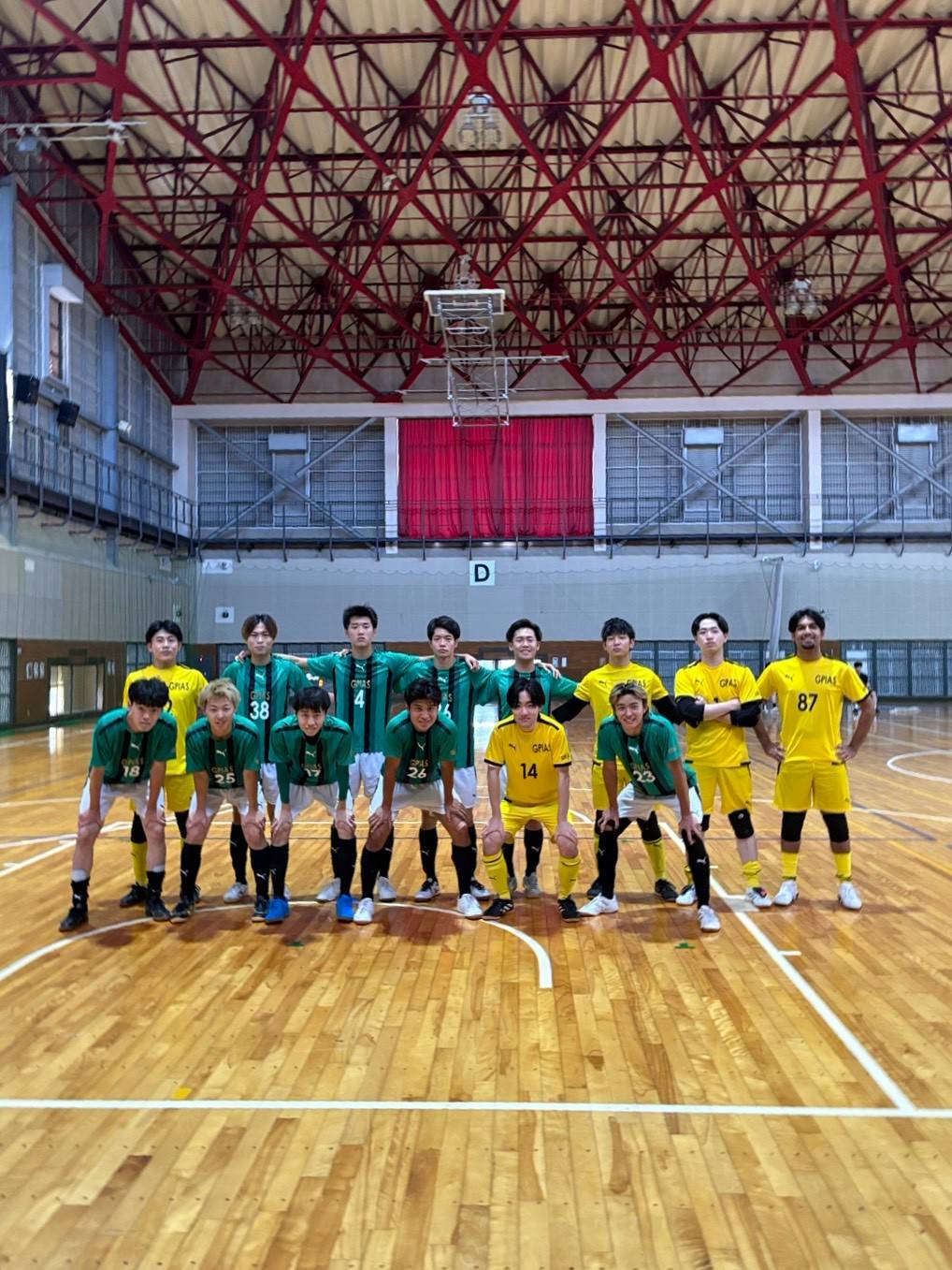 Futsal team gathered in a gym